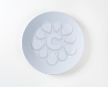 Empty round gray dinner plate