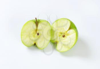 Halved fresh juicy green apple