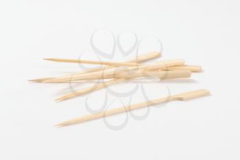 group of paddle-shaped wooden skewers