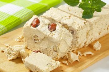 Pieces of Greek halva with almonds