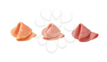 assorted deli meat slices on white background