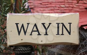 White wooden way in sign