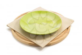 plate at napkin cloth on white background