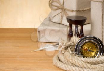 parcel wrapped with brown paper tied with rope  on wood background
