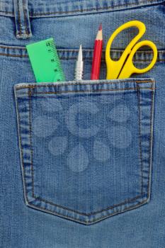 pen and pencil in jeans packet