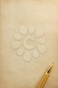 gold pen on parchment background texture