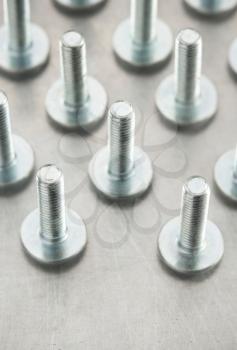 bolts tool at metal background texture