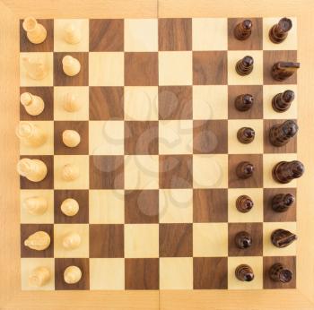 chess figures on board background