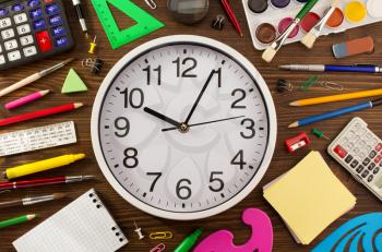 school supplies on wooden background