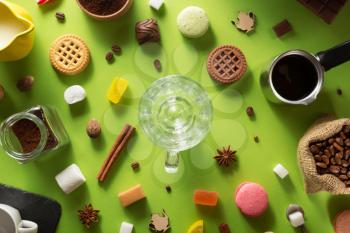 cup  and ingredients at colorful paper background