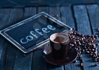 coffee background, coffee beans on the wooden table