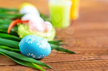 easter eggs on the wooden table, color eggs