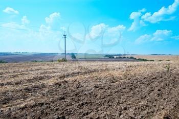 ploughed field with blue sky in Ucraine