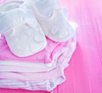 baby clothes on the table, clothes for girl