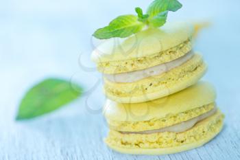 lemon macaroons with mint on the white table