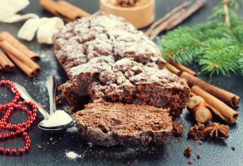 chocolate cake and christmas decoration on a table