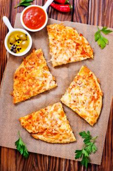 Fresh pizza with aroma spice and cheese