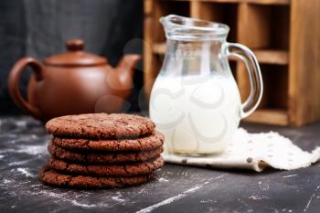 sweet chocolate cookies on the wooden table