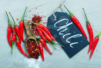 chilli peppers on the table, red hot peppers