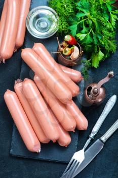 sausages on the black table, stock photo