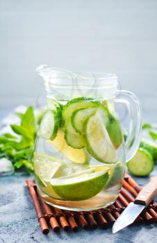 drink with lemon and cucumber in the jug