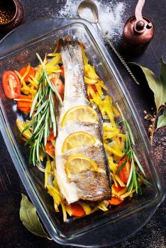 baked fish, baked fish with vegetables on plate