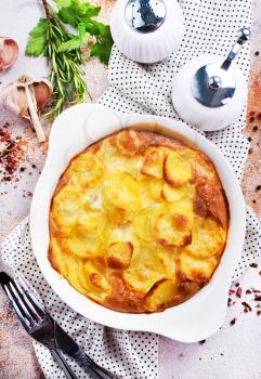 gratin from potato with spice and cheese