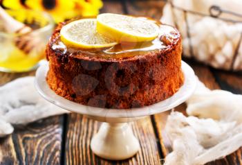 lemon pie on white plate and on a table