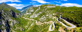 Aerial view of a winding road in the mountains of Greece