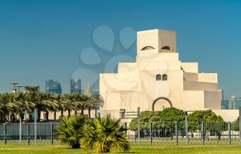 Doha, Qatar: December 24, 2017: The Museum of Islamic Art. Built in 2008, it has a uniquely modern design influenced by ancient Islamic architecture