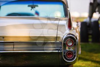 Back view of classic vintage car. Old retro car. Classic vintage car. Shallow depth of field. Selective focus.