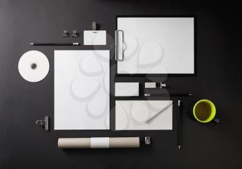 Blank stationery set on black background. Template for branding identity for designers. Top view.