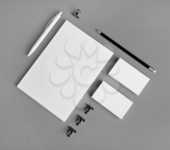 Corporate identity template. Branding design mockup. Blank stationery set on gray paper background. Flat lay.