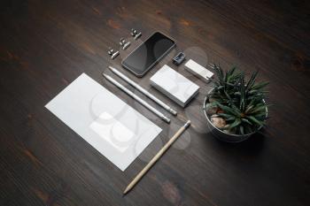 Stationery mock up. Blank corporate identity template on wood table background. Responsive design mockup.