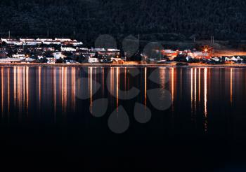 Night Tromso community with lights reflections background hd