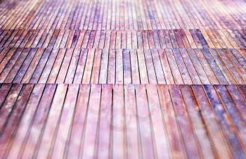 Diagonal wooden quay texture bokeh background