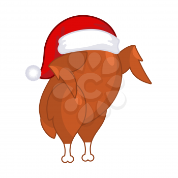Christmas turkey in Santa Claus cap. Roast fowl on plate. Fried chicken in festive red hat. holiday food for new year
