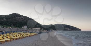 Beautiful summer morning on a sandy beach in Dhermi, Albania