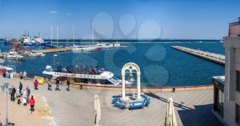 Odessa, Ukraine - 04.20.2019. View of the harbor and piers with parking for private yachts in the Odessa seaport on a sunny spring day