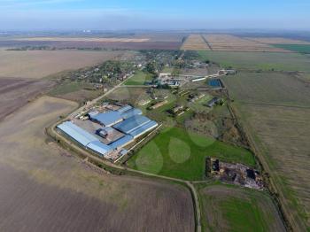 Top view of the village with houses and hangars for the storage of grain.