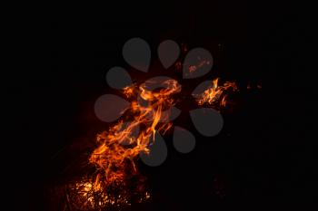 Fire. Burning of rice straw at night.