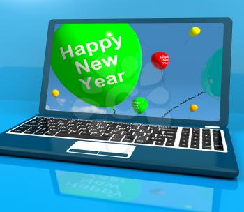 Laptop Computer Showing Happy New Year Message