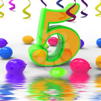 Number Five Party Displaying Multi Coloured Decorations And Confetti