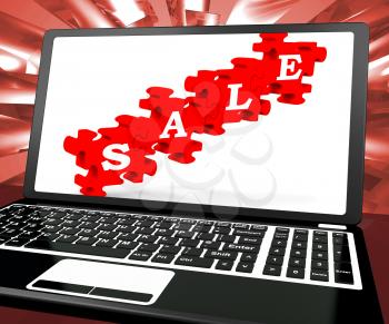 Sale Puzzle On Laptop Shows Price Discounts And Online Promotions