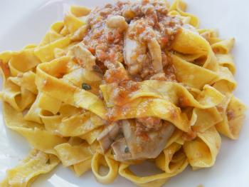 Italian typical dish of pasta cooked according to tradition with fresh seafood.