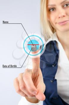 Security Concept. Business woman and her security system scans the fingerprint