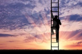 Man climbs the stairs to sky. Concept of the career ladder