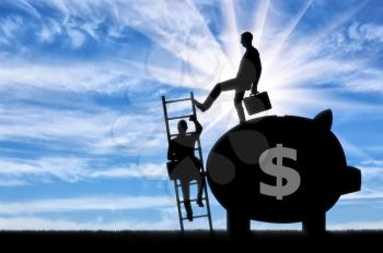 Silhouette of a businessman climbs the stairs, and another businessman standing with a piggy bank pushes this ladder. The concept of greed and inequality