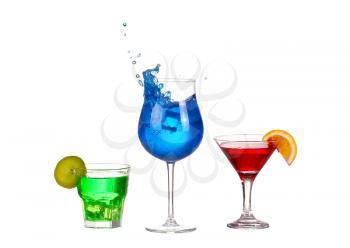 Three cocktail red blue and green isolated on white background splash