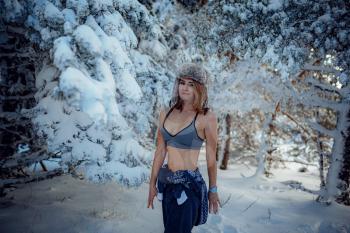 sexy girl in the winter forest in underwear, woman in snow. idea and concept of a strong and seasoned woman, Russian woman